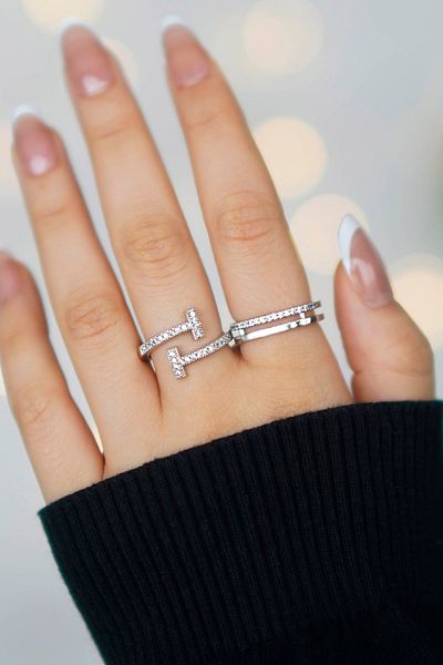The Collection Set of 2 Zircon Stone Waterway and t Model Silver Adjustable Women's Rings (2 Rings)