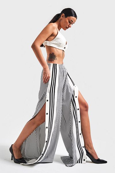 its basic Women's Black Striped Color Side Button Palazzo Fit Loose Cut Design Trousers