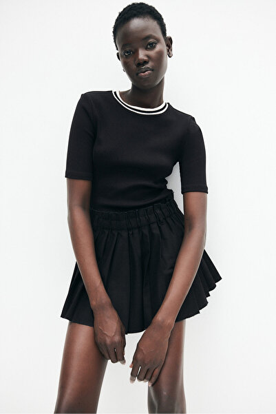 H&M Bedene Oturan Tişört