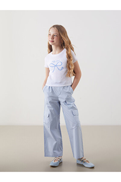 LC Waikiki Özmarka Нова колекция Еластични панталони с кармани за момичета