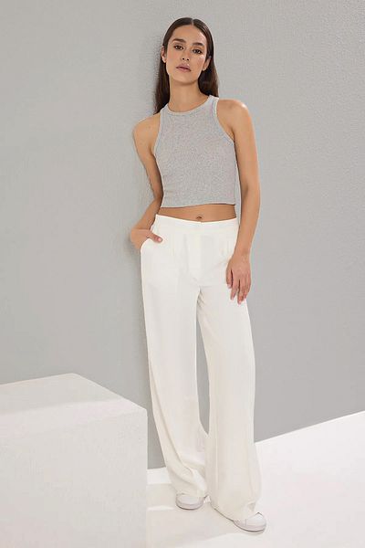 Trendyol Collection Білі широкі штани з заниженою талією з еластичною спинкою TWOSS25PL00021