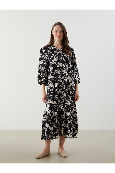 LC Waikiki New season from güli̇s gi̇yi̇m black v neck floral a cut dress