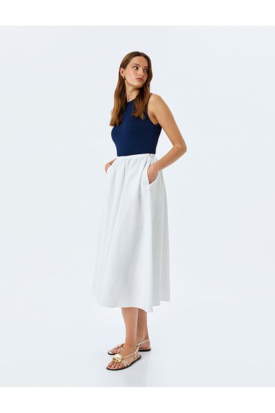 Koton Elastic waistband cotton A-line maxi bell skirt.