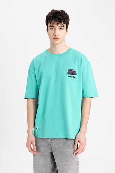 DeFacto Keith Haring Oversize Wide Fit Crew Neck Short Sleeve T-Shirt B8094Ax24Sm