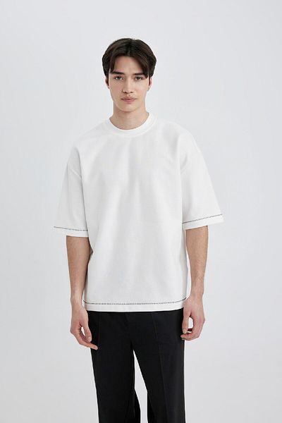 DeFacto Locker geschnittenes, kurzärmliges T-Shirt aus schwerem Stoff mit Rundhalsausschnitt C0147ax24sp