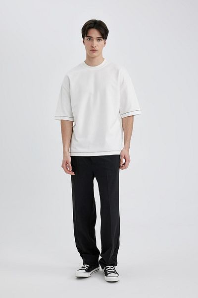 DeFacto Locker geschnittenes, kurzärmliges T-Shirt aus schwerem Stoff mit Rundhalsausschnitt C0147ax24sp