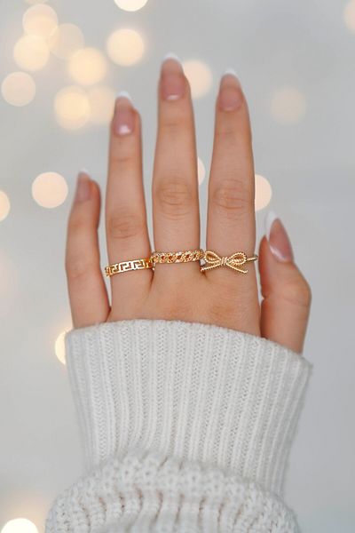 The Collection 3-Piece Zircon Stone Chain, Maze and Bow Gold Adjustable Women's Ring Set (2 Rings)