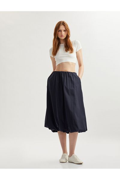 Koton Medium rise cotton long flared skirt.