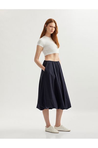 Koton Medium rise cotton long flared skirt.