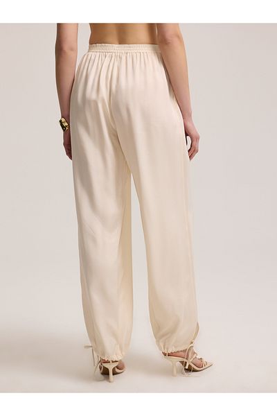 BAQA Open Beige Trousers with Lace-up Cuffs
