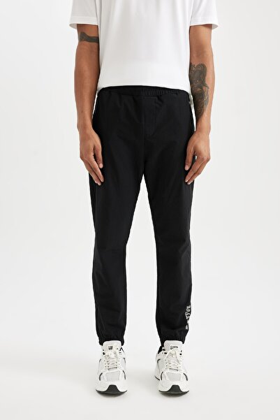 DeFacto Fit Dokuma Sporcu Jogger Eşofman Altı Slim Fit Dar Kesim Çift Cepli C1212ax24au