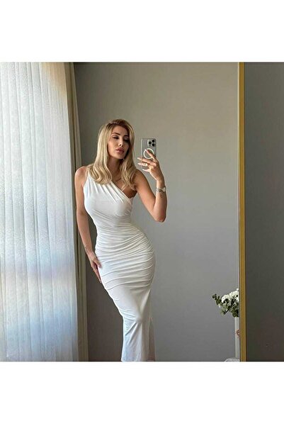 aytenli TEK OMUZ BÜZGÜLÜ YIRTMAÇLI MAXİ BOY BEYAZ ASTARLI ELBİSE