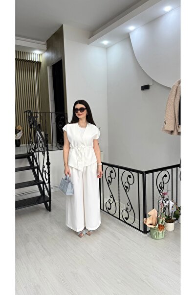 Butik Beyaz belden bağlamalı bağcıklı yelek & bol pantolon kumaş ikili takım