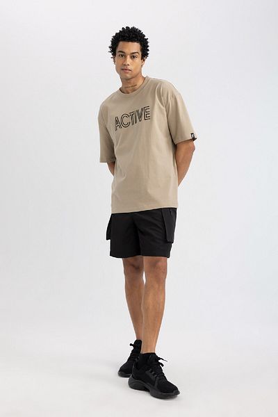 DeFacto Φαρδύ υφαντό σορτς με τσέπες Oversize Fit - C1530ax24sm