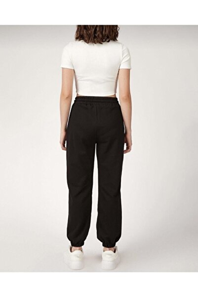 Lion Company Dámská tepláková souprava černé barvy s elastickými nohavicemi