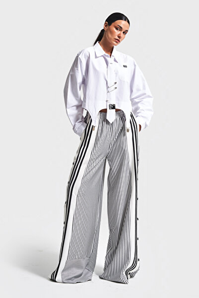 its basic Women's Black Striped Color Side Button Palazzo Fit Loose Cut Design Trousers