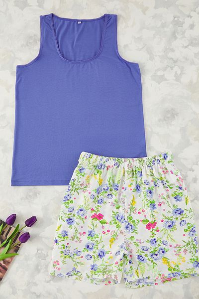 Trendyol Curve Blaues Pyjama-Set mit buntem Blumenmuster – Oberteil und Unterteil gewebt TBBSS25AI00058
