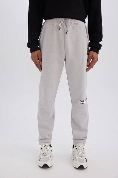 DeFacto Fit Nba Toronto Raptors Χοντρό Jogger Φούτερ Τυπική Εφαρμογή Μέση με Τσέπες Με Κορδόνια D6573ax25s