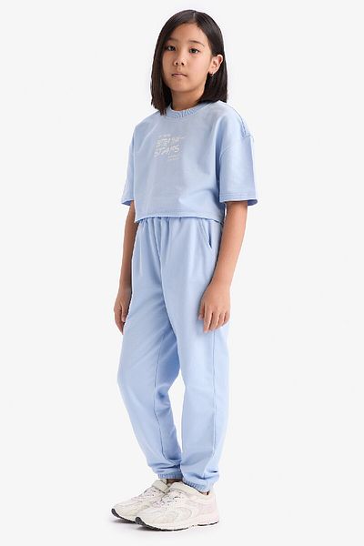 DeFacto 2-teiliges Set für Mädchen mit Rundhalsausschnitt, bedrucktem Kurzarm-T-Shirt und elastischen Jogginghosen an der Taille Z8983