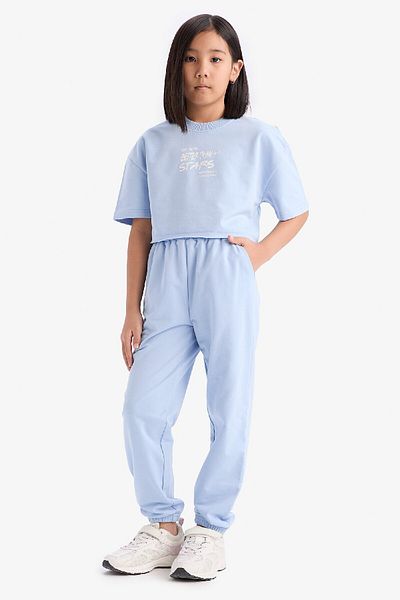 DeFacto 2-teiliges Set für Mädchen mit Rundhalsausschnitt, bedrucktem Kurzarm-T-Shirt und elastischen Jogginghosen an der Taille Z8983