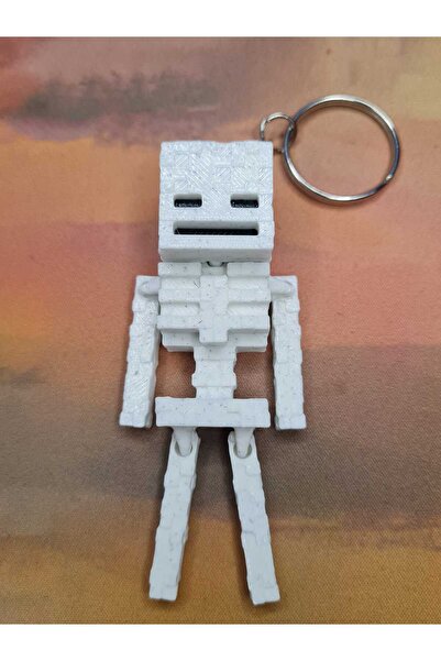 teteoka سلسلة مفاتيح متحركة من ماك سكيليت