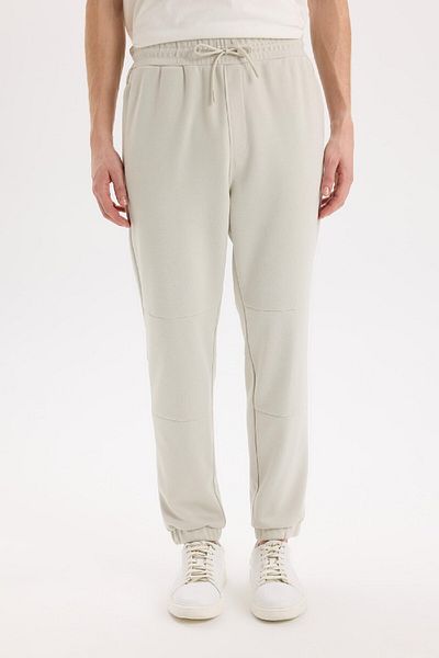DeFacto Schmal geschnittene, schmale Jogginghose mit Reißverschlusstasche, Schnürung an der Taille und elastischem Bein B3657ax25sp