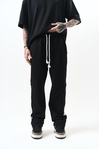 Respire بنطال رياضي فضفاض بتفاصيل مخططة للرجال باللون الأسود