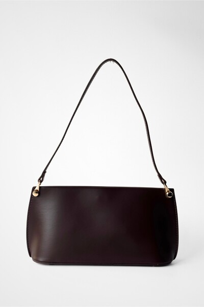 Yuka Atelier حقيبة كتف صغيرة من Goa Minimal مع تفاصيل إكسسوارات