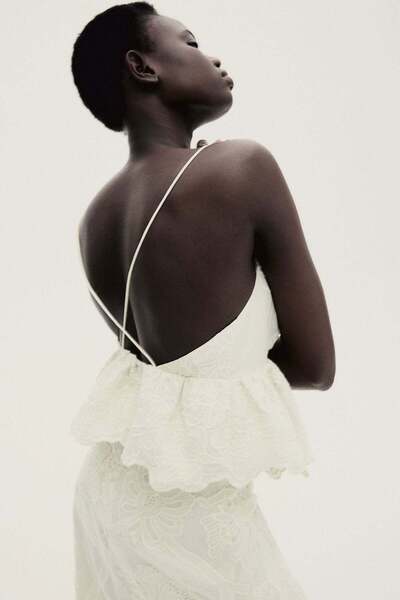 H&M Embroidered peplum top