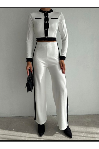 Butik Merrline Жіночий комплект з курткою та брюками з тканини