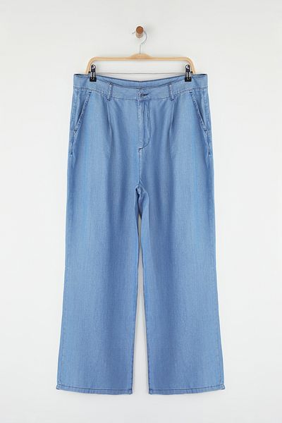 Trendyol Curve Blaue Tencel-Jeans mit hoher Taille und weitem Bein in Übergröße