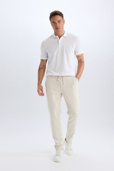 DeFacto 100 % Baumwolle, reguläre Passform, kurzärmeliges Basic-Polo-T-Shirt aus einfarbigem Piqué-Stoff C1293ax25sp