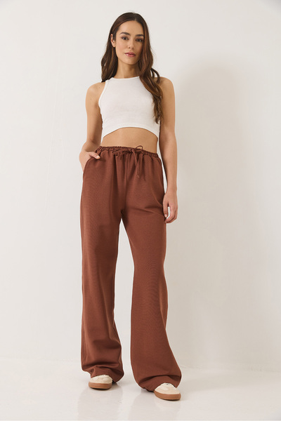 Bianco Lucci Dámské plátěné kalhoty Palazzo s elastickým pasem a detailem kapsy 80182 60271083