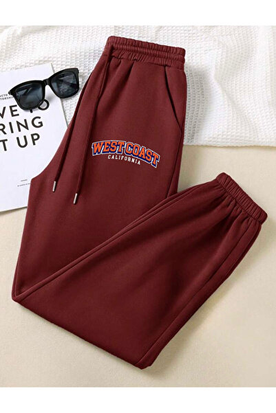 RPT MODA بنطال رياضي مريح بقصة واسعة وجيب مطاطي وطبعة ويست كوست من الأسفل