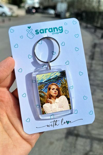 SARANG سلسلة مفاتيح بإطار شفاف - لانا ديل ري
