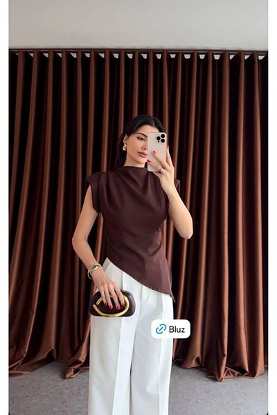 bm bessomoda fashion boutique Γυναικεία μπλούζα με φερμουάρ στην πλάτη με ασύμμετρη κοπή
