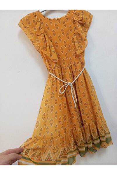 AKŞEN GİYİM KIZ ÇOCUK KOLLAR FIRFIR DETAYLI ASTARLI KEMERLİ DÜŞÜK OMUZ KOL 10-11-12 YAŞ ŞİFON ELBİSE