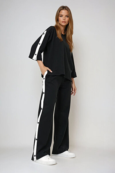 VAGGON Női fekete, nyakú, pattintható záródású, kétszálas tréningruha Prmx13486