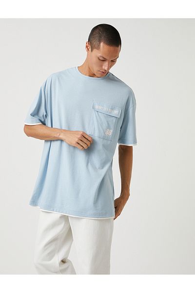 Koton Tricou oversize pentru colegiu, cu gât crew, imprimat cu detaliu de buzunar