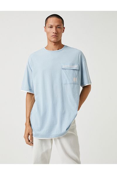 Koton Tricou oversize pentru colegiu, cu gât crew, imprimat cu detaliu de buzunar