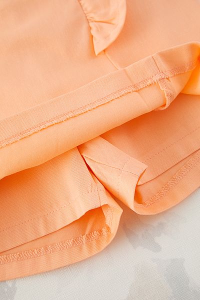 TRENDYOLKIDS Oranžová dívčí základní šortky s volánky, sukně, hladká pletená souprava