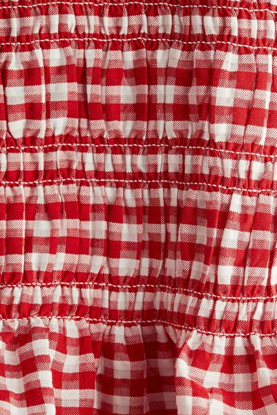 H&M بلوزة مزينة بأشرطة