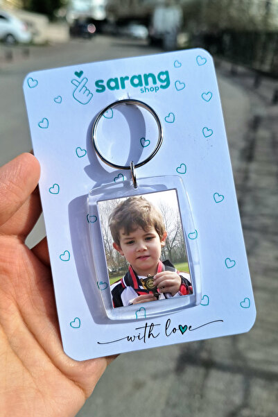 SARANG الطفل فريدي كادوغلو - سلسلة مفاتيح بإطار شفاف