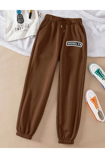 RPT MODA ΦΟΡΜΑ JOGGER ΜΕ ΕΛΑΣΤΙΚΟ ΜΠΡΟΥΚΛΙΝ ΜΕ ΕΚΠΤΩΣΗ ΜΕ ΤΣΕΠΕΣ