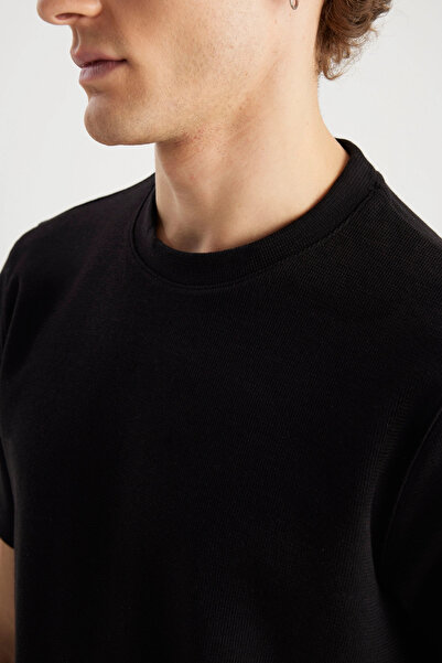 WRANGLER Ανδρικό μπλουζάκι με υπνωτική εφαρμογή με υφή μαύρο Basic - W2510718001