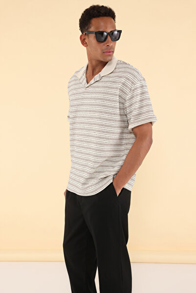 Trendyol Collection Унісекс футболка-поло з широким вирізом та смугастим коміром в стилі "оверсайз