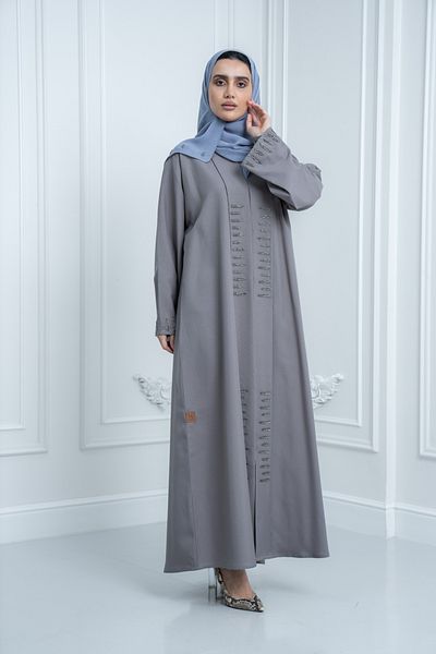 LAVİNİA Lavinia women Abaya embroidered with arrows on the front and sleeves. Elegant silver colour