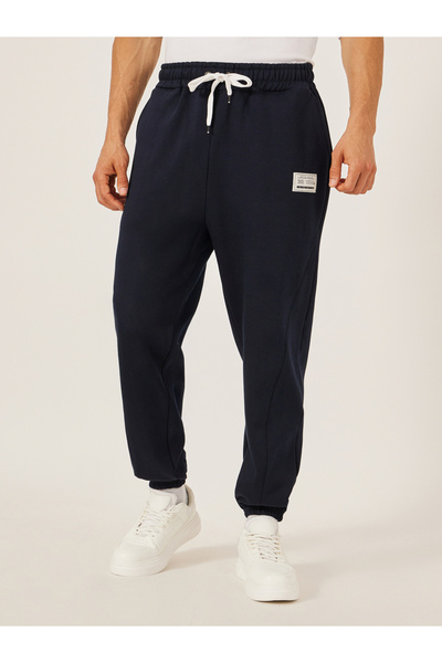 Styli بنطال جري كبير الحجم مع شريط ربط وتفاصيل شارة