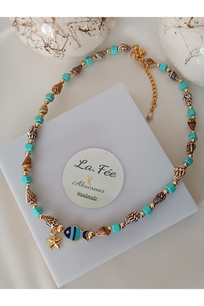 La fee aksesuar قلادة على شكل نجم البحر بتفاصيل السمك وصدف البحر مصنوعة من خر...