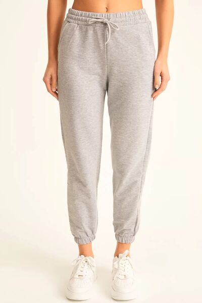 UYN SPORT Зручні джоггер-штани з широкими штанинами